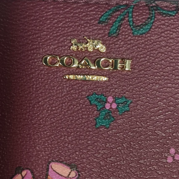 Coach Burgundy Wristlet with Floral Accents - Picture 3 of 7